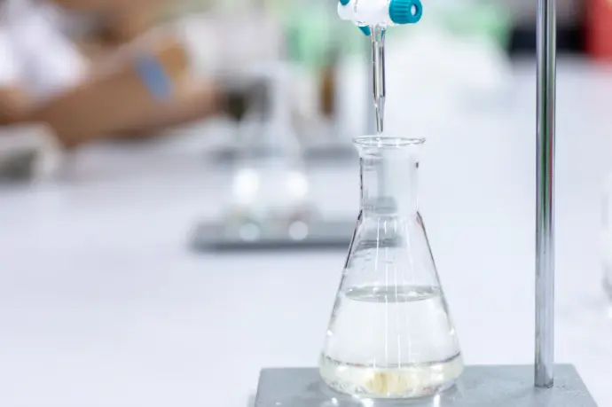 Secondary students in a chemistry practical